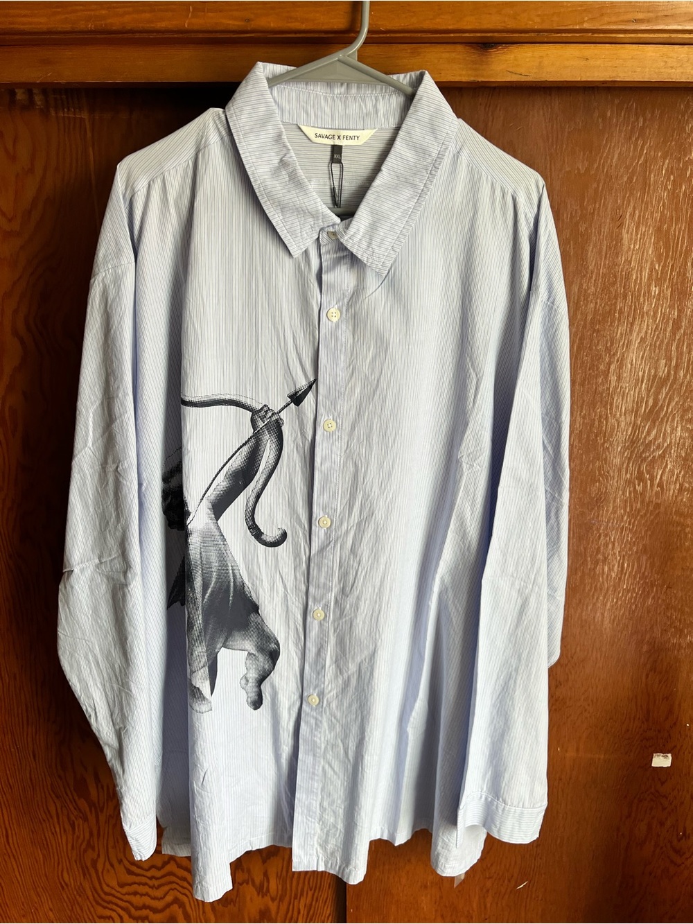 Savage X Fenty Light Blue Pinstripe Button-Up Shirt with Black Archer Graphic